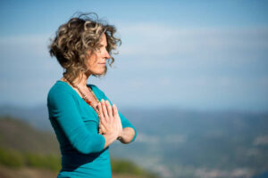 Yoga exercises in nature on mountains
